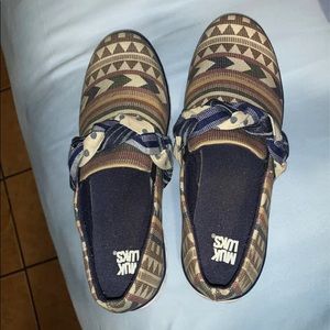 Muc Luke Tennis Shoes never worn size 9.5